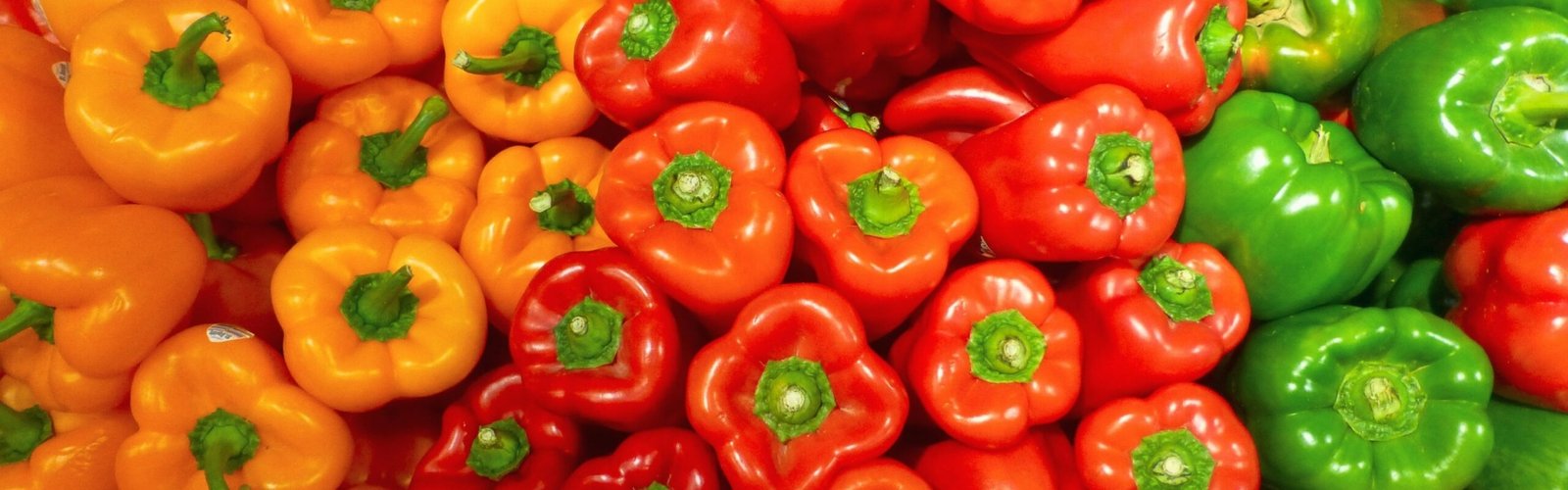 orange bell peppers on white ceramic plate